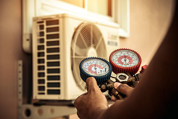 Professional Ductwork Repair technician working in Macon, MO